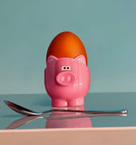 Pink Pig Egg Cup Still Life by Christopher Green