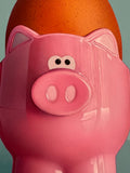 Pink Pig Egg Cup Still Life by Christopher Green