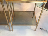 Pair of French brass and smoked glass side tables