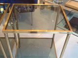 Pair of French brass and smoked glass side tables