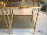 Pair of French brass and smoked glass side tables