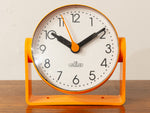 1970s German DIE HAUSUHR Rotating Orange Desk Clock