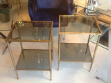 Pair of French brass and smoked glass side tables