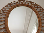 1960s Oval Sunburst Rattan Mirror