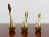VINTAGE BRASS SWAN FAMILY PAPERWEIGHT SET