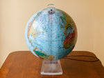 1980's World Discoverer Illuminated Scan-Globe with a curved Acrylic Stand