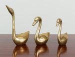 VINTAGE BRASS SWAN FAMILY PAPERWEIGHT SET