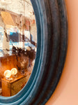 V. Large Round Wall Mirror with a Pale Blue Velvet Frame